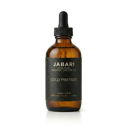 Brown bottle with authetic castor oil black cap labeled 'Jabari' on a white background